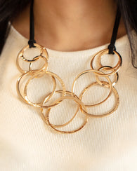 Spiraling Out of COUTURE - Gold